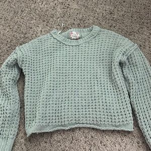 green sweater